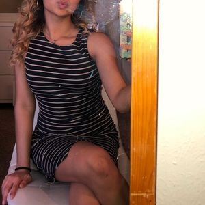 Striped and fitted dress